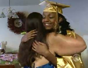 graduate hugged by foster mom-CBSVid