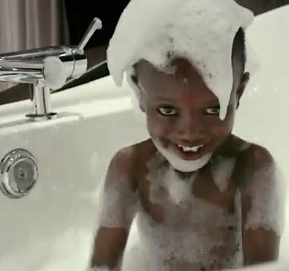 African boy gets bath - WATERisLIFE