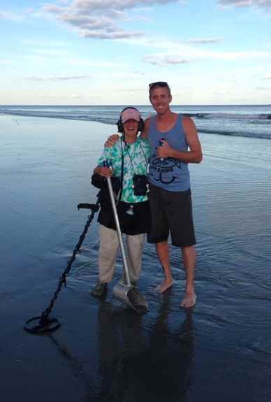 metal detector on beach finds ring-IMGUR