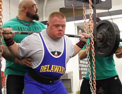 weightlifting Down syndrome man