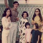 60s banker with Vietnamese staff - family photo