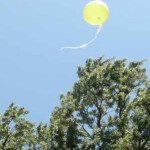 balloon yellow in sky