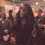 Black singer in flashmob-SowetoGospelChoir