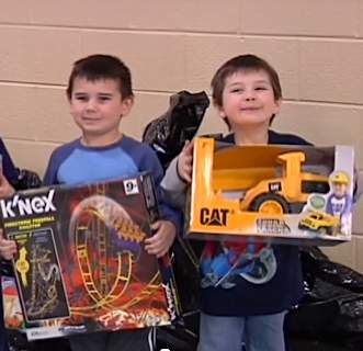 Toy giveaway kids receive-WBKOvid