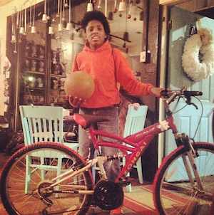 boy with bike A CUP OF COMMON WEALTH