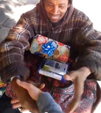 homeless guy gets Christmas present