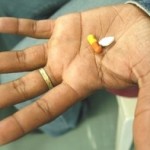 AIDS Hiv medicine in hand