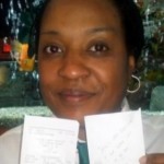 waitress holds tip receipt for thousand dollars