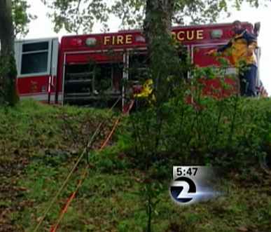 Rescue trucks ropes down ravine-KTVU