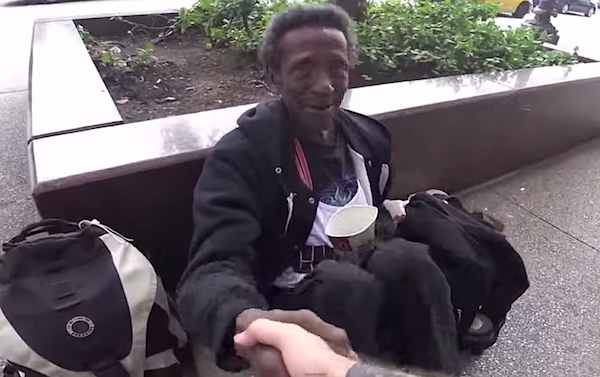 homeless-man-shakes-hands-gift-reKindle