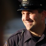 smiling-police-officer-cc-PeterMartinHall
