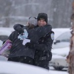hug in snow for Lowell cop-750px