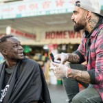 nasir sobhani cutting hair 2 copyright Scott Bradshaw