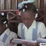 HaitianKidsReceivingBooks FaceBook screen shot4