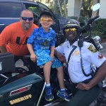 cop with kid-Broward Sheriff’s Office Facebook