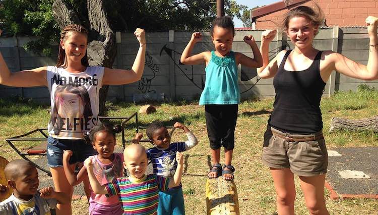 Natalie-Wiechel-with African kids-submitted-volunteering solutions SA