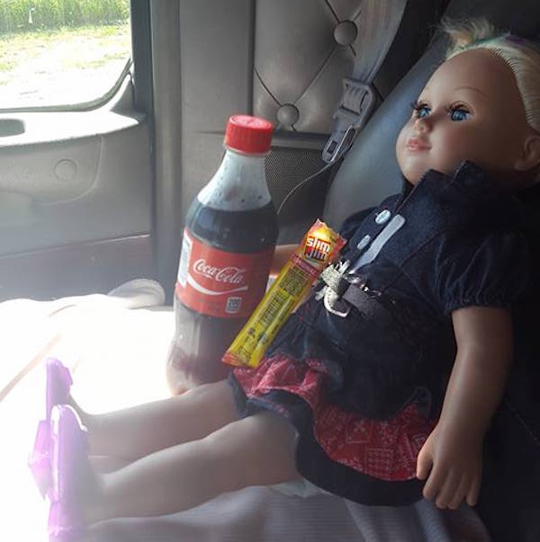 doll in car with coke-McCain Trucking-permission