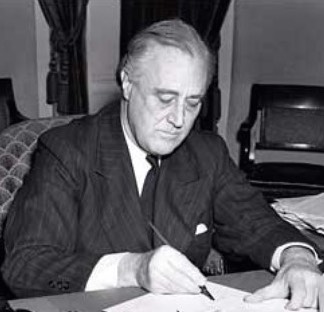 franklin-d-roosevelt-signs-lend-lease-act