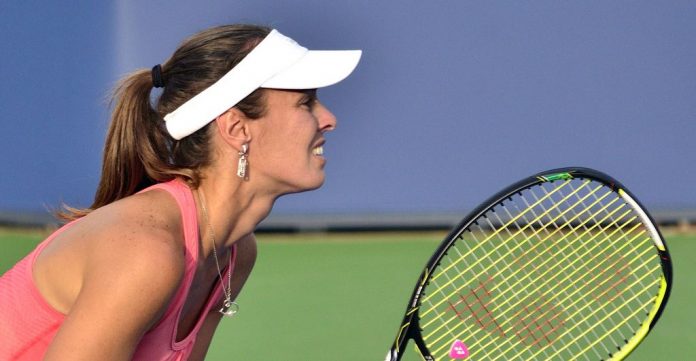 Martina Hingis playing tennis determination-CC-Steven Pisano