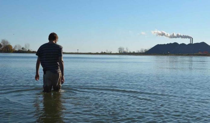 Chris Steele the Man Wading in Lake Erie Ohio-McKinley Corbley