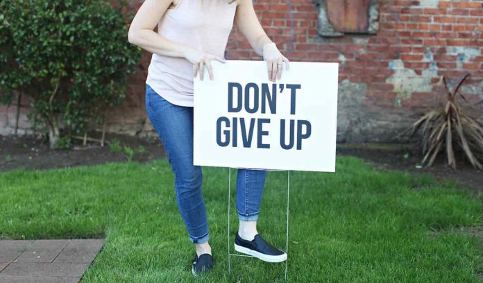 Don't Give Up Sign-Released