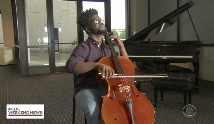 Eddie Adams Playing Cello-CBS News Youtube Screenshot