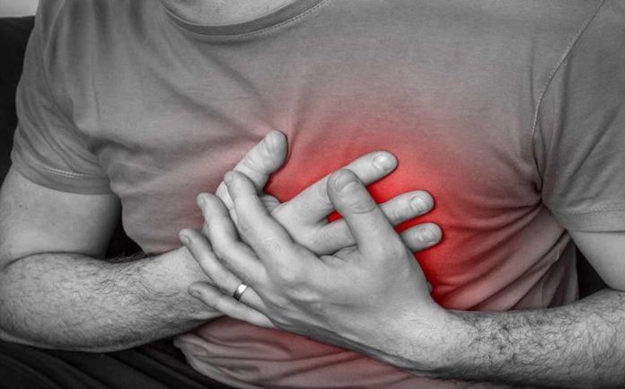 Man Clutching Heart Illustration-Kings College London Released