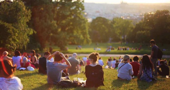 People-Sitting-Outside-on-Grass-nature community-Outdoors-Public-Domain
