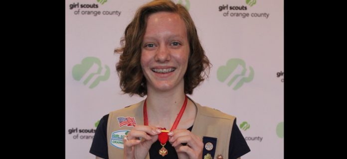girl scout Ava Kopecky with Medal of Honor-submitted