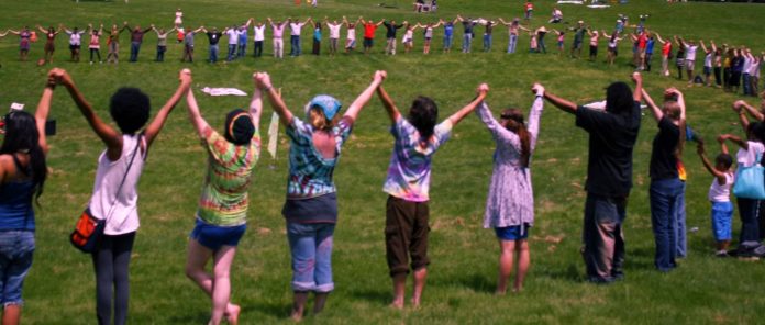 peace together-love holding hands cc-brian donovan