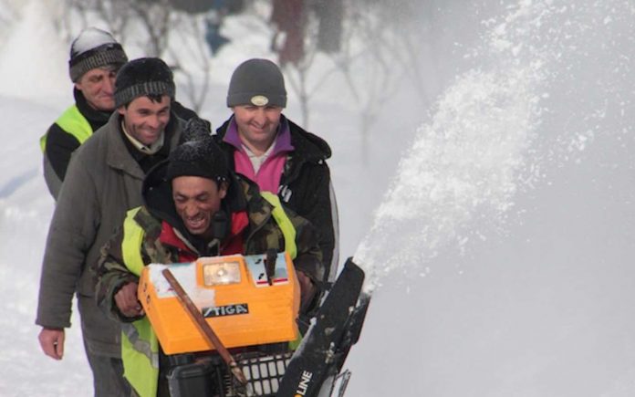 Happy Laughing Men on Snowblower Cropped-Public Domain