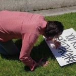 When Keanu Reeves Sees Sweet Fan Sign Posted in a Yard, He Hops Out of the Car to Leave His Autograph