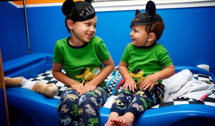 mickey mouse hats at bedtime with pajamas brothers-siblings-cc-Tim Malabuyo