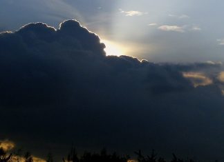sun behind storm clouds-cc-Erich-Ferdinand