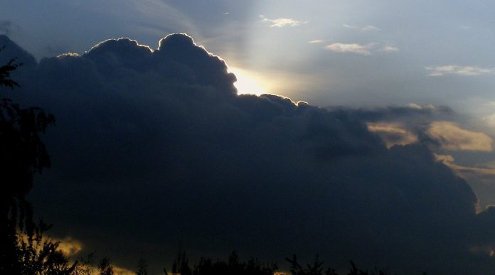 sun behind storm clouds-cc-Erich-Ferdinand