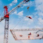 Daredevils Doing Flips on ‘World’s Largest Trampoline’ Suspended From Crane Just Proves ‘Anything is Possible’