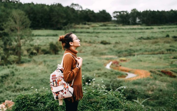 Asian woman dreaming of path travel-pudomain-Anthony Tran
