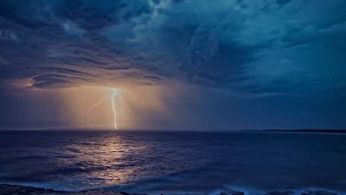Lightning Striking Water-Public Domain via Pikrepo
