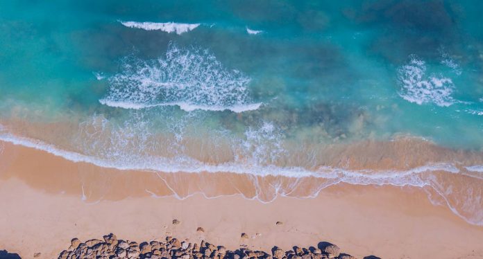 aerial-waves on beach-sea-ocean-pubdomain-Nigel Tadyanehondo