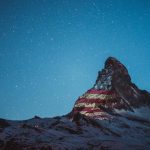 Swiss Village Has Been Projecting World Flags Onto One of Their Tallest Mountains in Solidarity of Pandemic