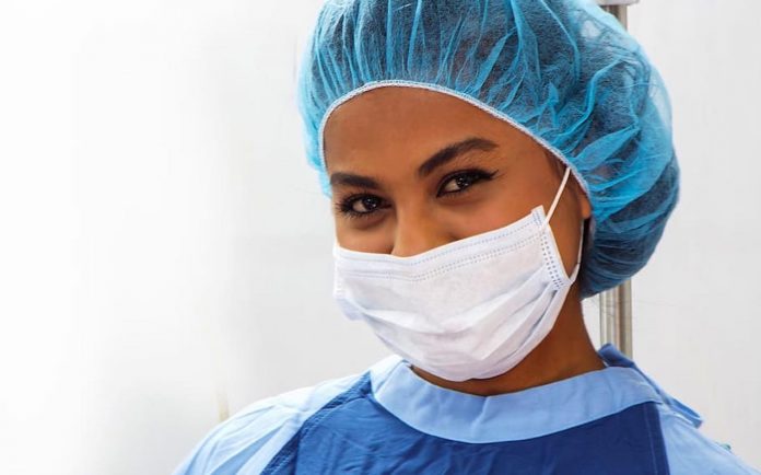 Smiling Surgeon Wearing Face Mask-Public Domain via Pxfuel