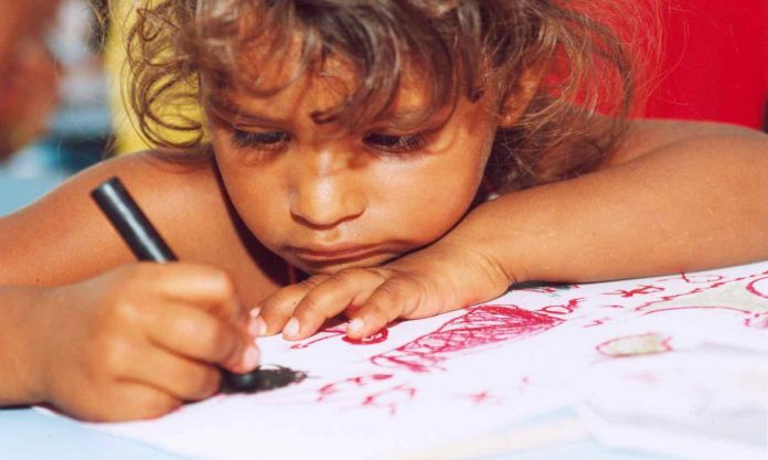 Young Little School Girl Coloring Crayon Drawing-Public Domain via Piqsels