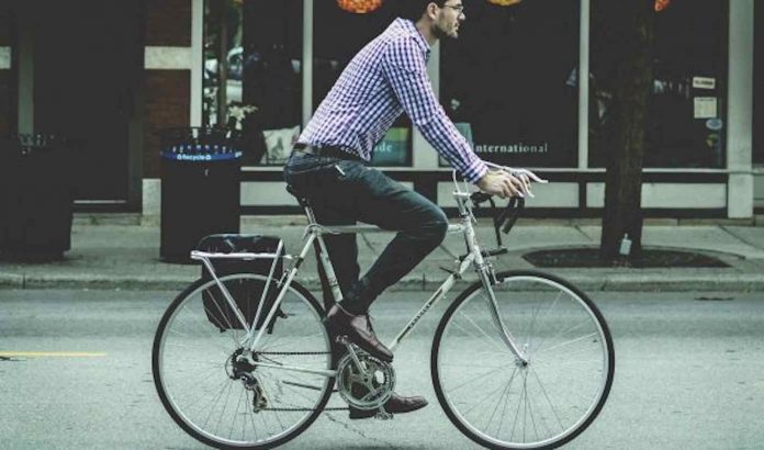Man Bicycling-University of Cambridge Released