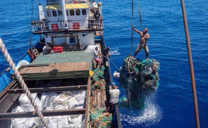 Giant net going into boat hold-clean-up-Ocean Voyages Institute
