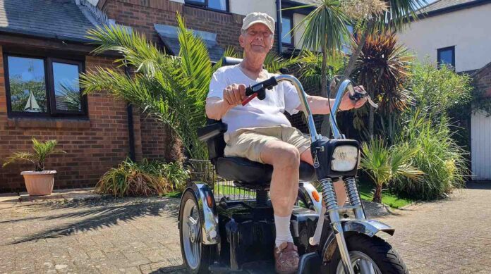 senior on mobility scooter-cropped-swns