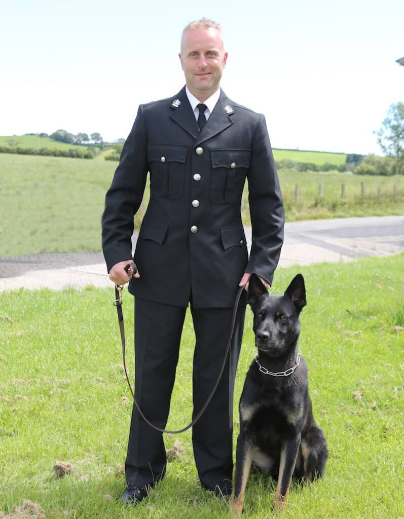 Officer Peter Lloyd and police dog Max, Photo by Dyfed-Powys Police