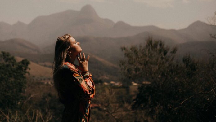 aging woman dreaming imagining future optimism mountains-pubdomain-Marcos Paulo Prado