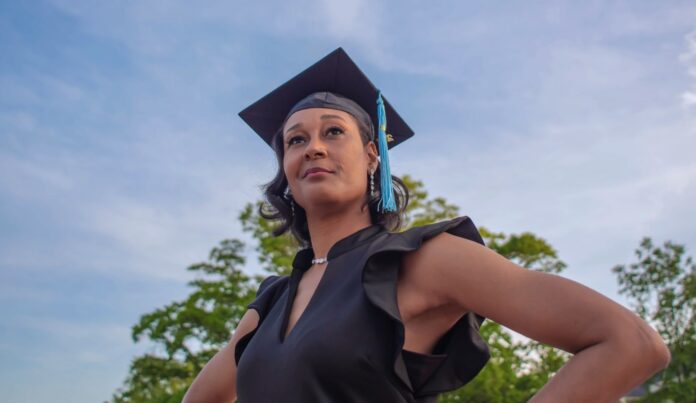 woman graduate power future education study-smart-pobdomain-Peyton Sickles