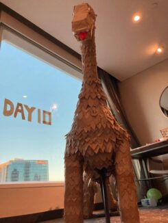 Family Builds Giant Dinosaur From Take-Out Containers During Hotel ...