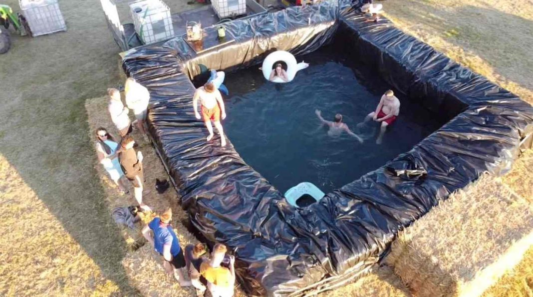 Baling Water These Young Farmers Built a DIY Swimming Pool With Hay